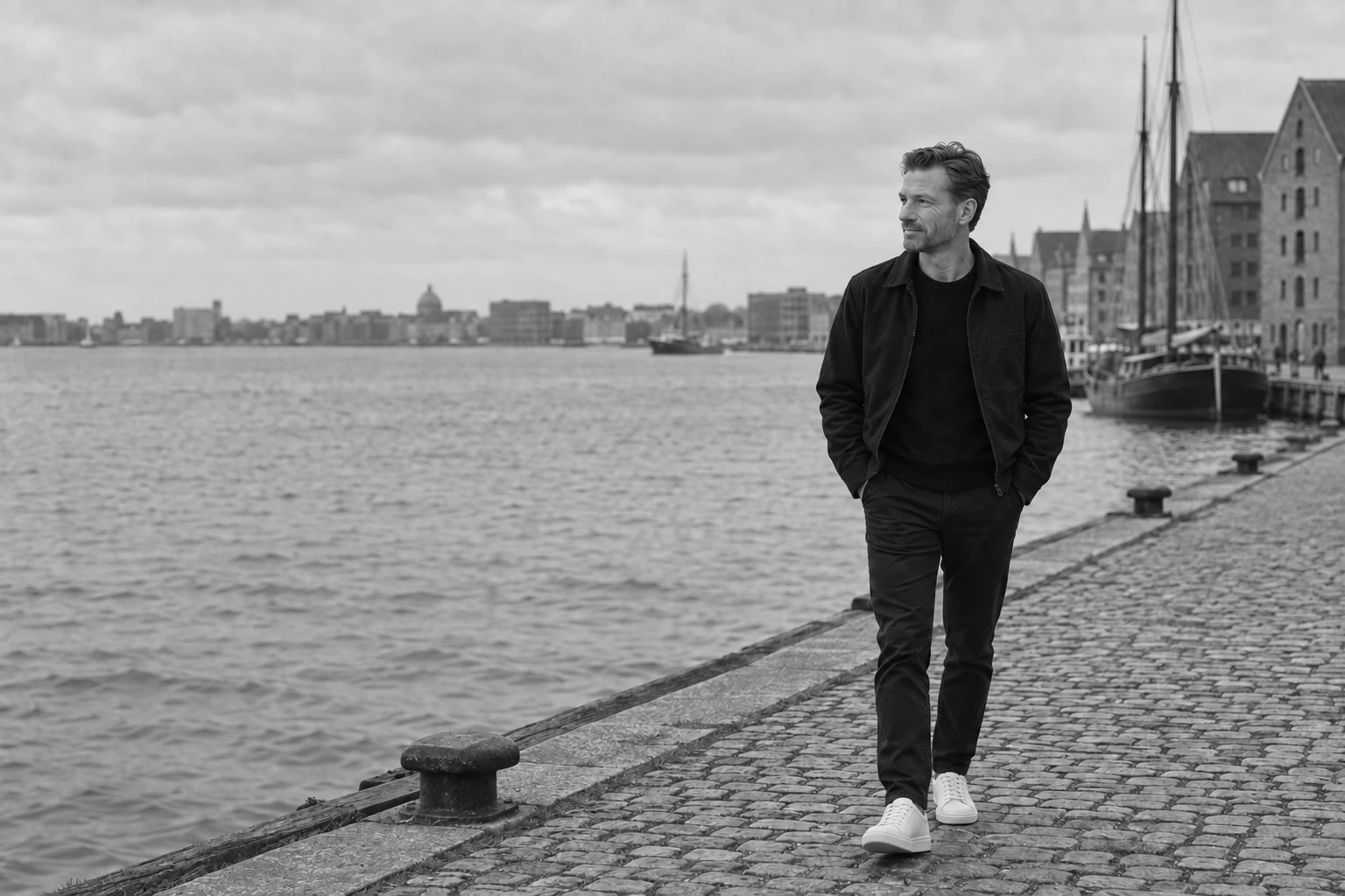 Jacob Top Møller walking along the Copenhagen harbour